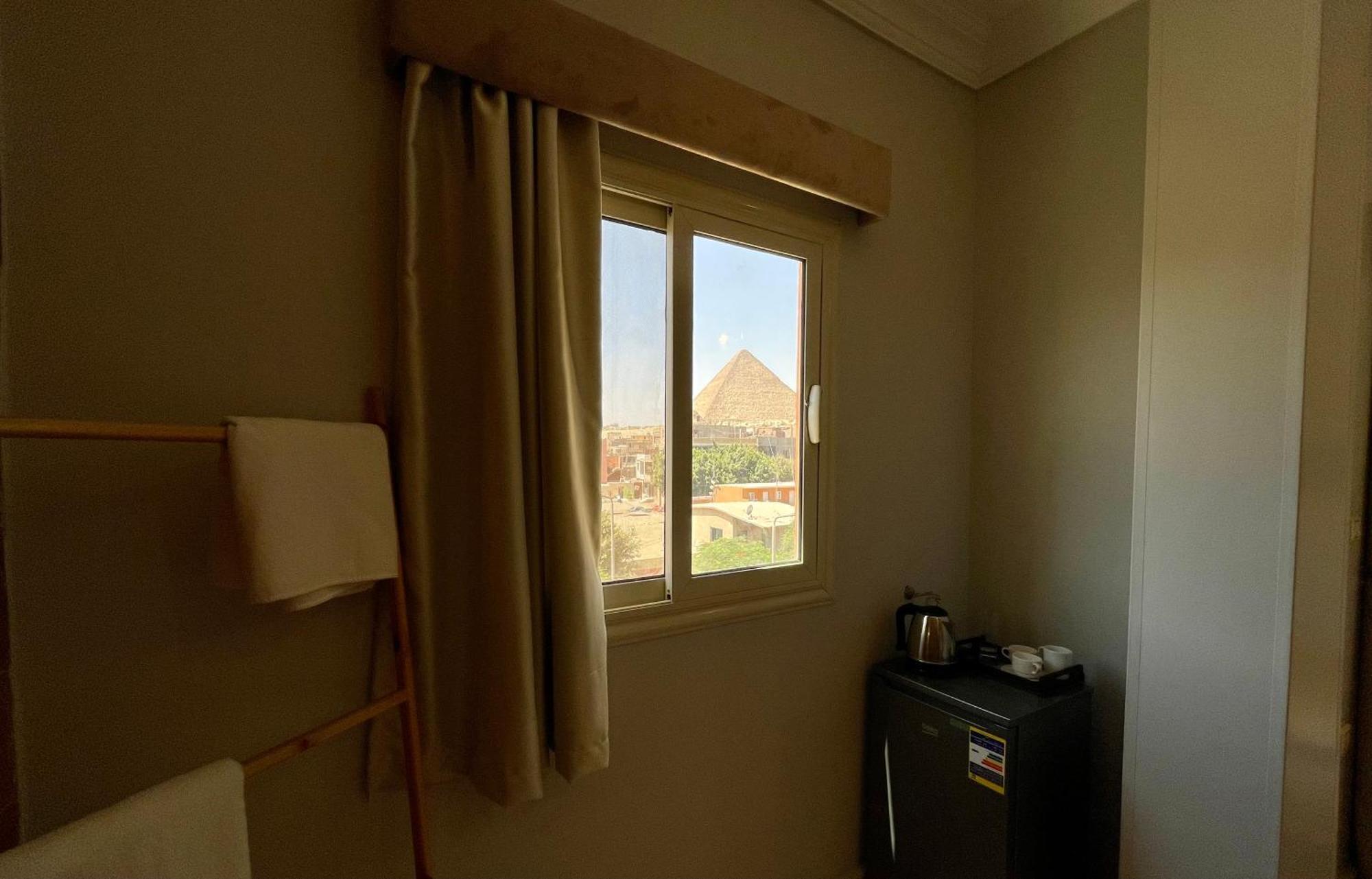 Pyramids Home Inn Kairo Bagian luar foto