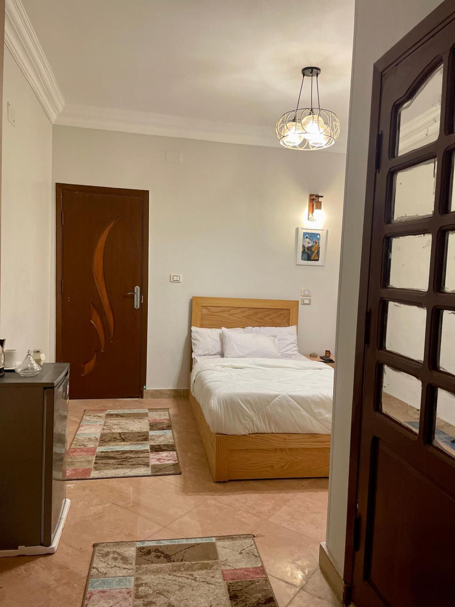 Pyramids Home Inn Kairo Bagian luar foto